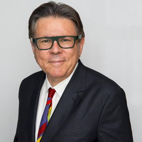 Producer Michael Hirsh in a black suit and tie