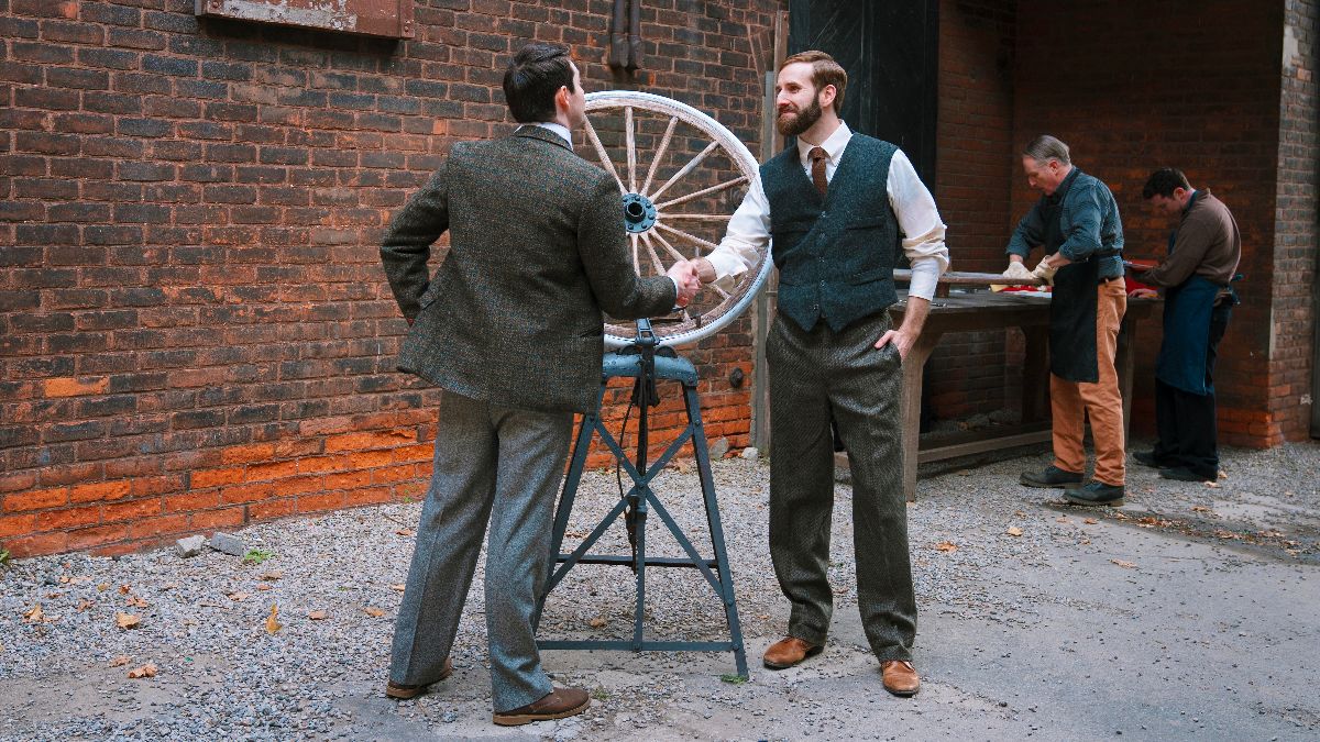 Harvey Firestone pitches Henry Ford on his solid rubber tires in The Mega-Brands That Built America. (Photo Credit: A&E Television Studios/Lucky8, Courtesy of HISTORY.)