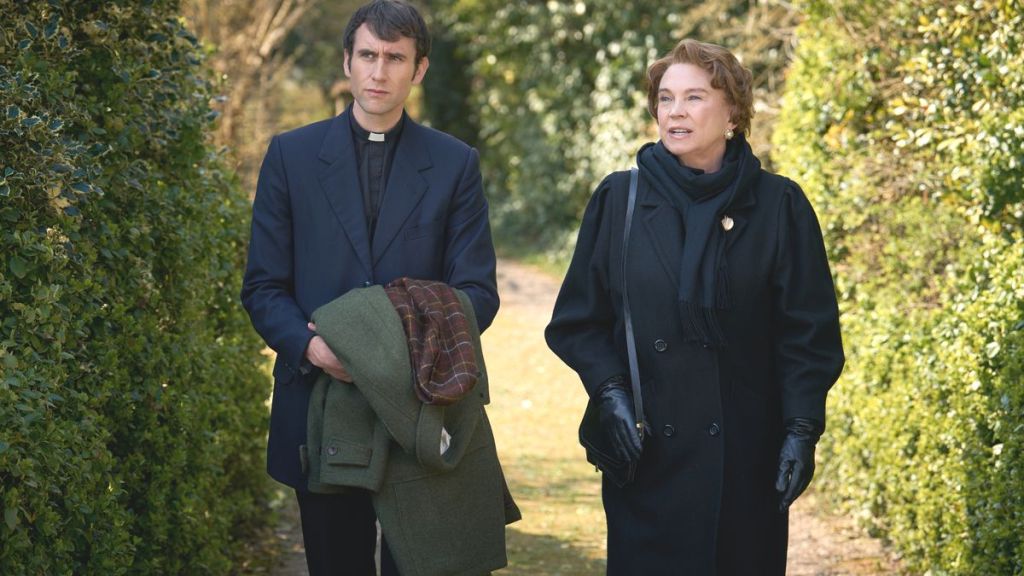 Matthew Lewis as Canon Clement and Amanda Redman as Audrey in Murder Before Evensong. (Photo Credit: Courtesy of Acorn TV.)