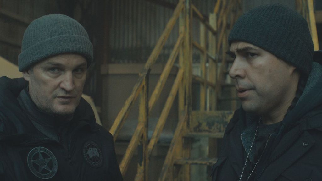 Actor Jason Clarke as Frank Remnick and actor Dallas Goldtooth as Hutch in The Last Frontier season 1, episode 4. (Photo Credit: Courtesy of Apple TV.)