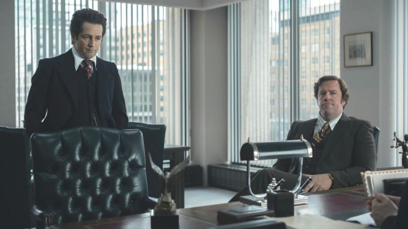 Actor Michael Angarano as Sam Almirante and actor Chris Sullivan as Bill Kunkle in the Peacock series Devil in Disguise: John Wayne Gacy. (Photo Credit: Courtesy of Peacock.)