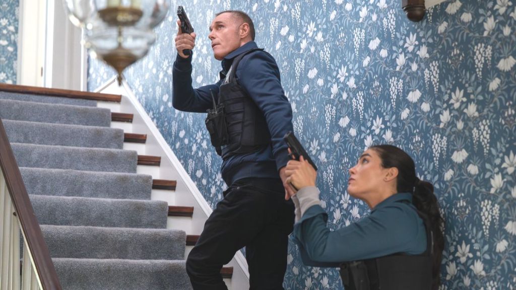 Actor Jason Beghe as Hank Voight and actor Arienne Mandi as Eva Imani in Chicago PD season 13 episode 8. (Photo Credit: Courtesy of NBC.)