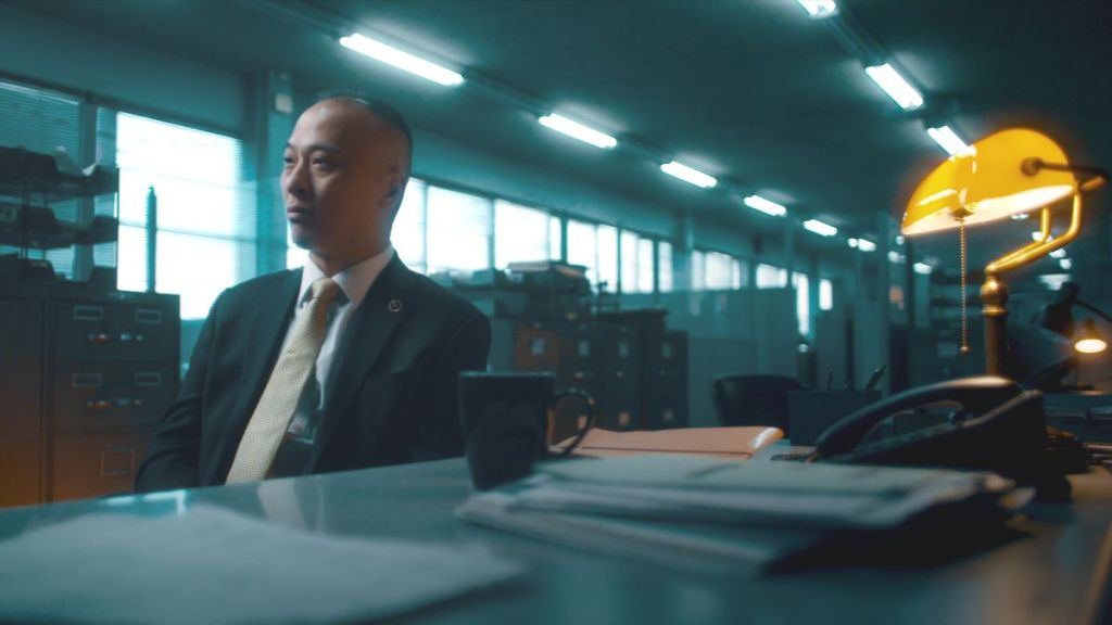 Retired NYPD detective Martin Chen is interviewed in Homicide: New York season 2. (Photo Credit: Courtesy of Netflix.)