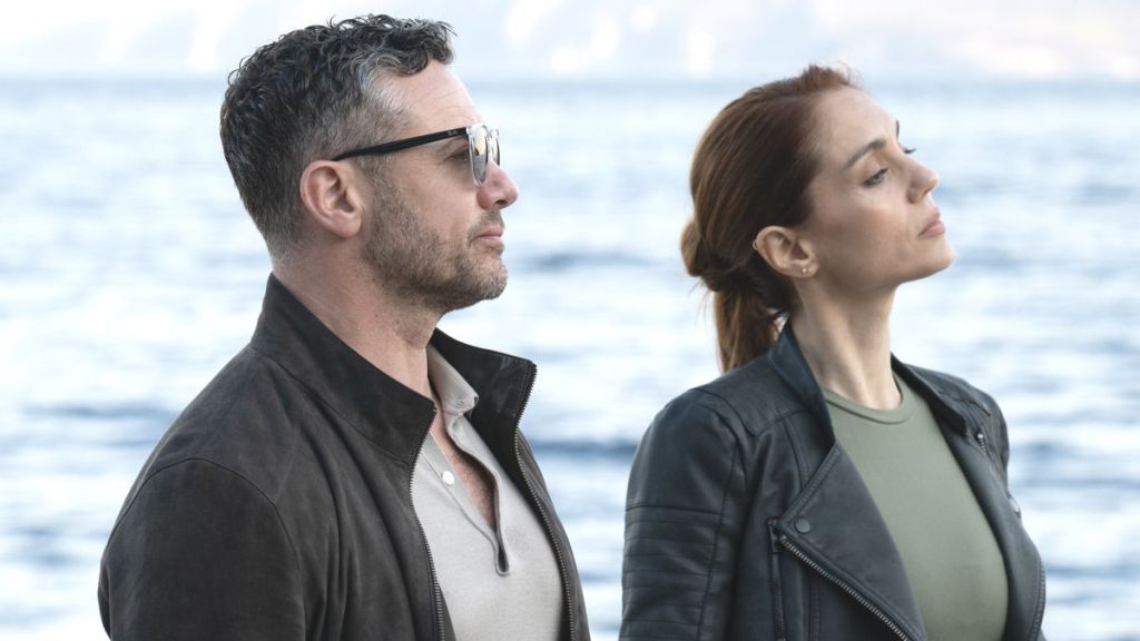 Warren Brown as Joe and Cristiana Dell'anna as Lara in A Taste for Murder. (Photo Credit: Courtesy of BritBox.)